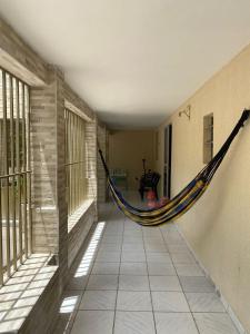 a hammock in the hallway of a house at Rancho Cariri (São Jorge do Cariri) in Bôca da Mata