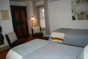 Postel nebo postele na pokoji v ubytování AUBERGE Knowlton