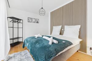 Säng eller sängar i ett rum på PEAKview: Penthouse / Zentrum / Netflix