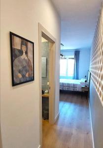 A bed or beds in a room at AnGiò holiday rooms