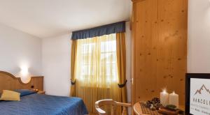 Voodi või voodid majutusasutuse Romantic Charming Hotel Rancolin toas