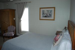 Postel nebo postele na pokoji v ubytování AUBERGE Knowlton