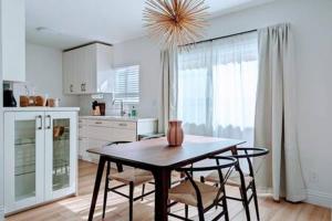 a kitchen with a table and two chairs and a table at Designer 1BR 1BA Culver City Sony Studios in Los Angeles
