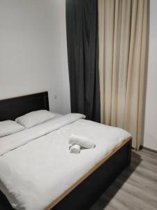 Ein Bett oder Betten in einem Zimmer der Unterkunft Comfortable apartment Kutaisi.