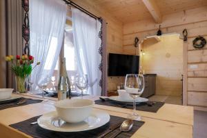 TV a/nebo společenská místnost v ubytování Domek Zakopane Deluxe & Spa na wyłączność