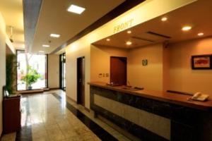 a lobby of a hospital with a bar in it at Hotel New Shizuoka in Shizuoka