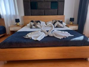 Postel nebo postele na pokoji v ubytování Studio Apartmani “Jarnečić”