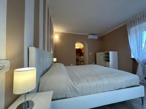 Letto o letti in una camera di Terrazza su Tocco