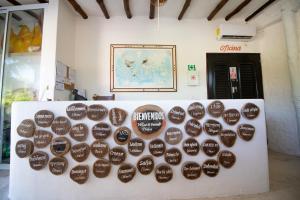 a display of chocolates on a wall in a room at Villas El Encanto Holbox in Holbox Island