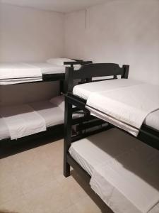 Postel nebo postele na pokoji v ubytování Hostel Shalom Adonai
