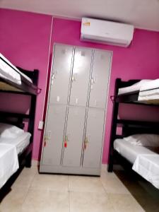 Postel nebo postele na pokoji v ubytování Hostel Shalom Adonai