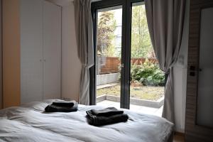 Posteľ alebo postele v izbe v ubytovaní Lovely Family Suite