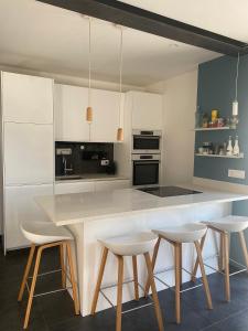 Kuchyň nebo kuchyňský kout v ubytování Apartments Bogic