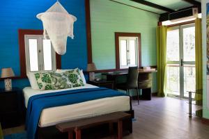 Voodi või voodid majutusasutuse Coyote Rooms toas