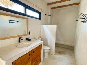 Koupelna v ubytování DOMA - Resort + 30 fotografií