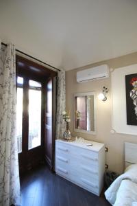 Postel nebo postele na pokoji v ubytování Casa 4 Archi + 37 fotografií