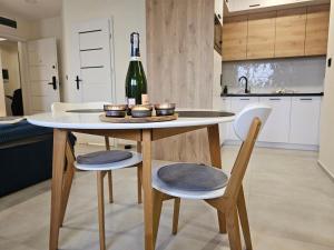 Kuchyň nebo kuchyňský kout v ubytování URBAN APARTMENTS PREMIUM Baildona 18A, Free Garage, Self Check-in + 15 fotografií