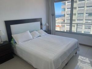 Ένα ή περισσότερα κρεβάτια σε δωμάτιο στο Apartamento en Santos Dumont