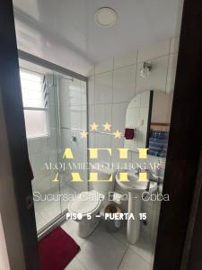 a bathroom with a shower with stars on the wall at El Hogar - Sucursal Calle Beni - Edificio Auriga 272 con Garaje cubierta in Cochabamba