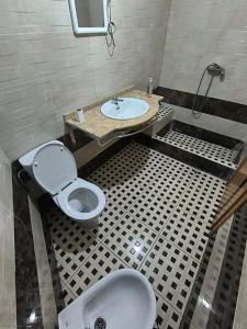 a bathroom with a toilet and a sink at Casablanca Geusthouse in Casablanca