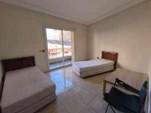 Un pat sau paturi într-o cameră la Casablanca Geusthouse