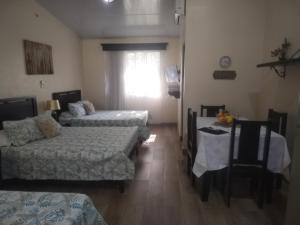 Postel nebo postele na pokoji v ubytování Villa jr 4 by Villas Oasis Guacalillo