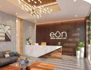an office lobby with a reception desk and a couch at Eon-ClarionSuites Apart-estudio zona 10 con AC in Guatemala