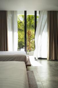 Voodi või voodid majutusasutuse Long Set Resort toas