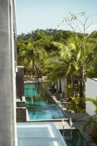 a swimming pool with a view of a resort at Long Set Resort in Koh Rong Island