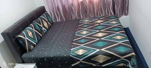Postel nebo postele na pokoji v ubytování Hotel Blue Orchid