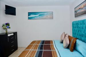 Postel nebo postele na pokoji v ubytování Hotel Casa ixtapan