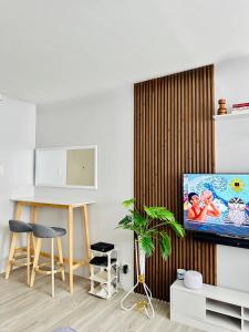 Μια τηλεόραση ή/και κέντρο ψυχαγωγίας στο Zen Haven Staycation beside EK +8 φωτογραφίες