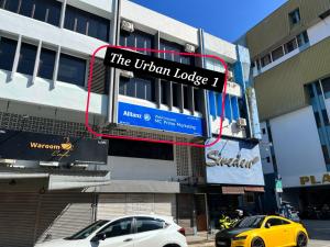a sign that reads the union lodge on the side of a building at The Urban Lodge 1 in Kuala Terengganu