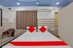 Cama o camas de una habitación en POP Hotel Dk Guest House