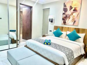 Ένα ή περισσότερα κρεβάτια σε δωμάτιο στο The Bay Sunflower Apartment +14 φωτογραφίες