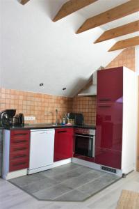 Kuchyň nebo kuchyňský kout v ubytování Apartment Kraemer Dax