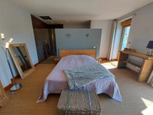 Postel nebo postele na pokoji v ubytování Gite Stone & Spa