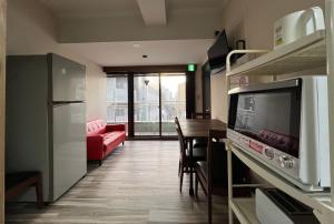 Kuchyň nebo kuchyňský kout v ubytování Le Tour Hotel Akihabara Kanda 楽途ホテル神田秋葉原