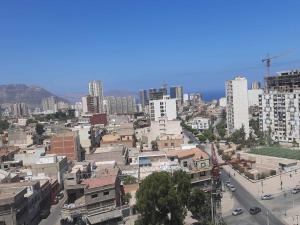 a view of a city with tall buildings at Résidence amira 5 in Oran