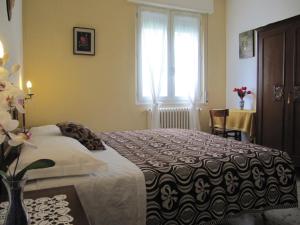 Ένα ή περισσότερα κρεβάτια σε δωμάτιο στο Casa Bruna