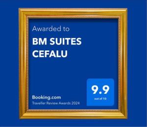 uma moldura de imagem dourada com um cartaz que lê a credencial bm suites em BM SUITES CEFALU em Cefalù