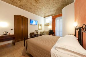 TV a/nebo společenská místnost v ubytování Hotel Sole