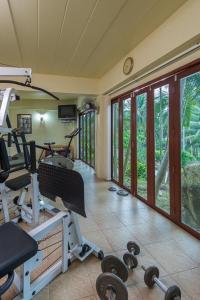 a room with a gym with weights and a treadmill at Entire 5 beds Pool Villa on hill side. in Amphoe Koksamui