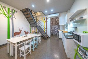 Una cocina o cocineta en Sigang Grandma House
