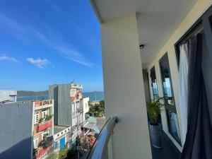 a balcony with a view of a city at JOYCE HOUSE in Quy Nhon