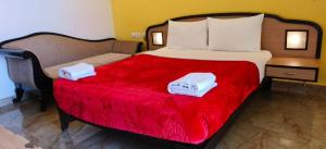Cama o camas de una habitación en Calangute Residency