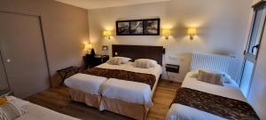 Postel nebo postele na pokoji v ubytování Hotel le Bellevue