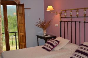 Cama o camas de una habitación en Hotel Rural Remanso