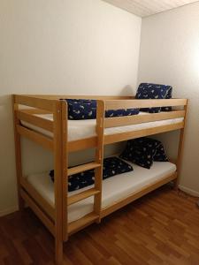 a bunk bed room with two bunk beds at Apartment Jolie in Interlaken