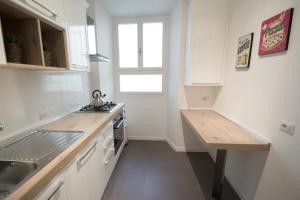 Kuchyň nebo kuchyňský kout v ubytování Vantaggio Apartment